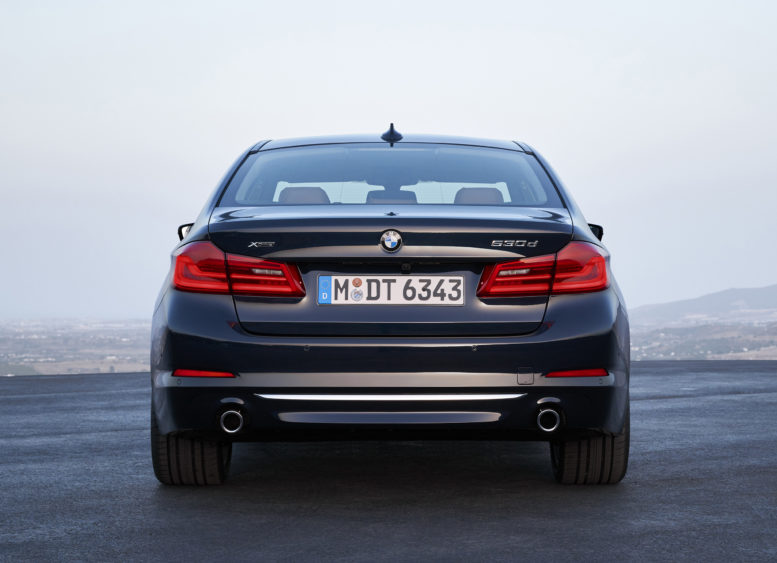 2017-bmw-5-series-rear-view-wider-higher