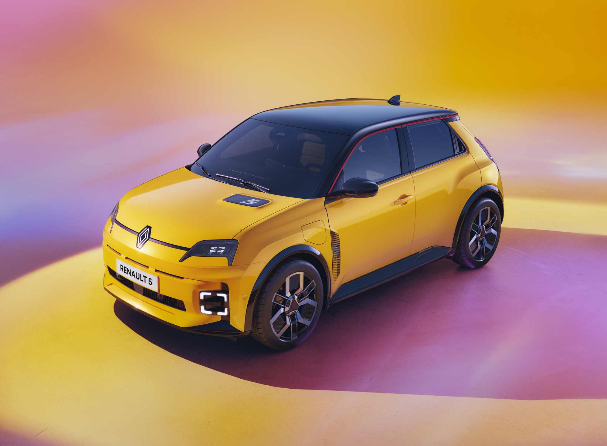 Renault 5 E-Tech Electric front three-quarter view in Pop Yellow