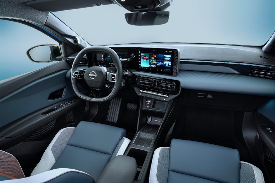 2025 Nissan Micra EV interior dashboard and front seats